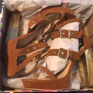 Tan suede buckled heel
